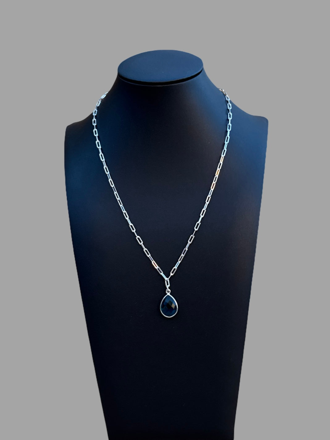 Necklace - Sterling silver paperclip chain with a blue topaz pendant