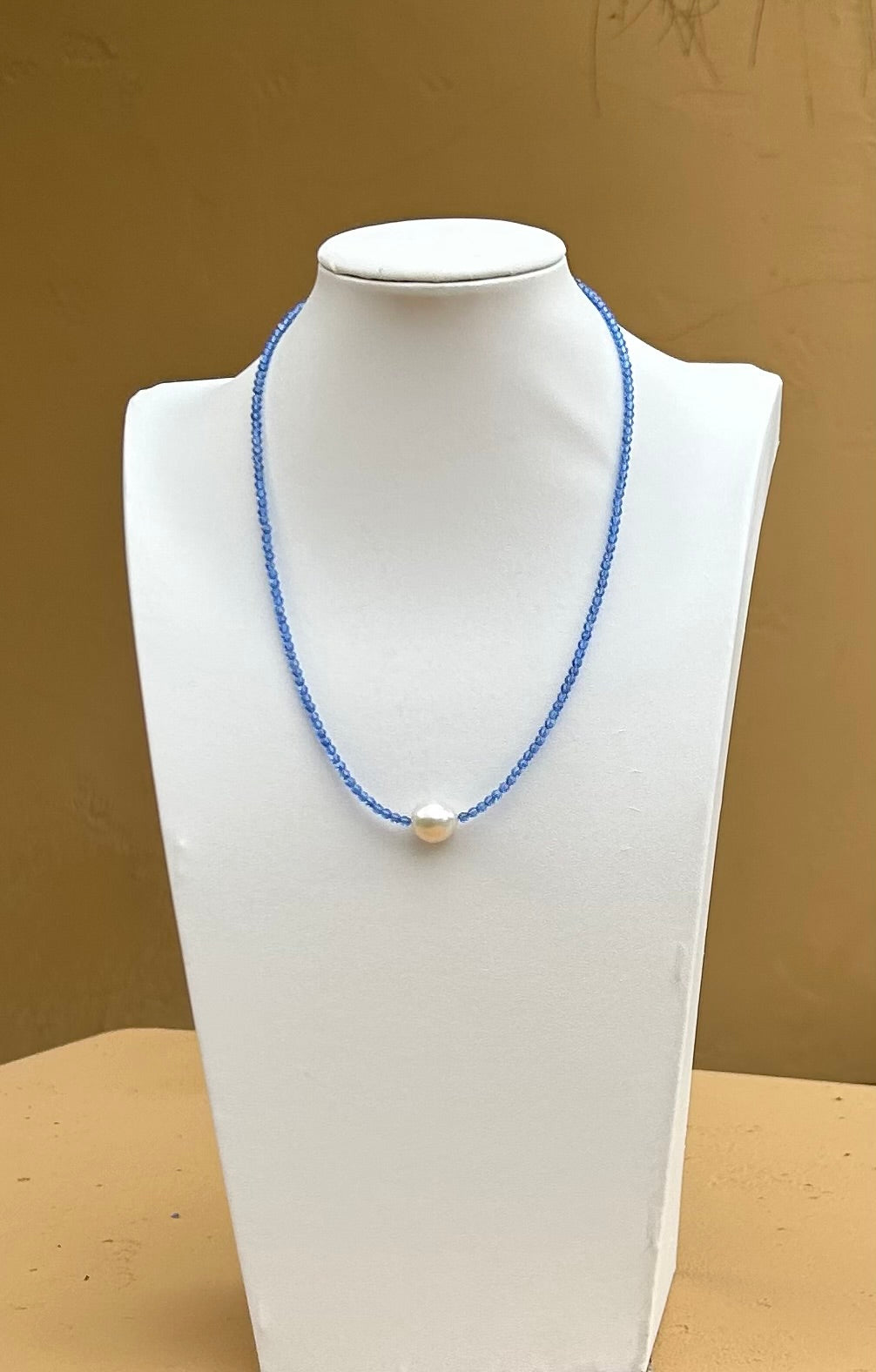 Necklace - 3mm Sapphire blue Swarovski crystals with a large white pearl and silver toggle