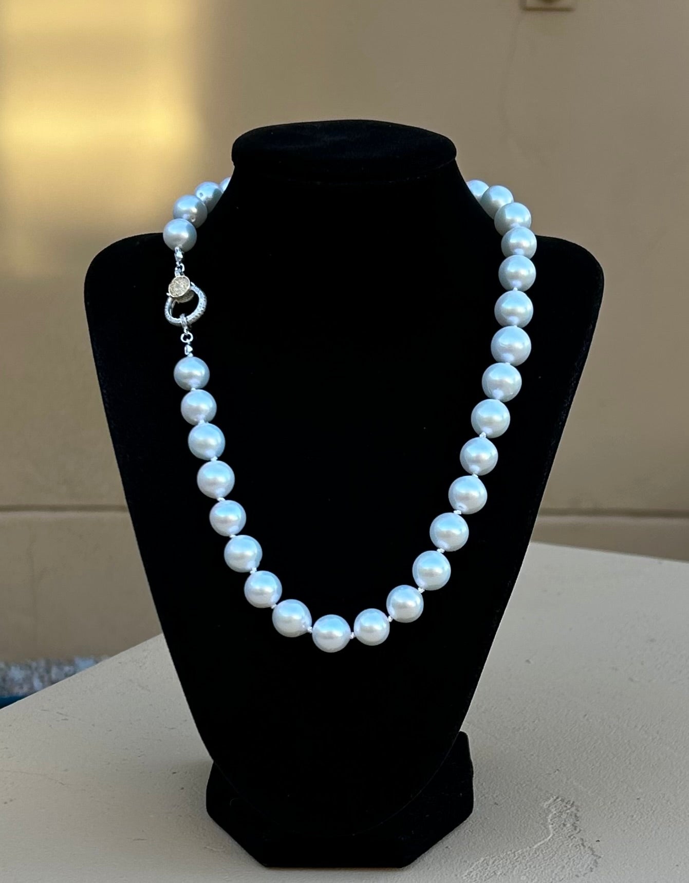 Necklace - Large white knotted pearls with a diamond pave clasp