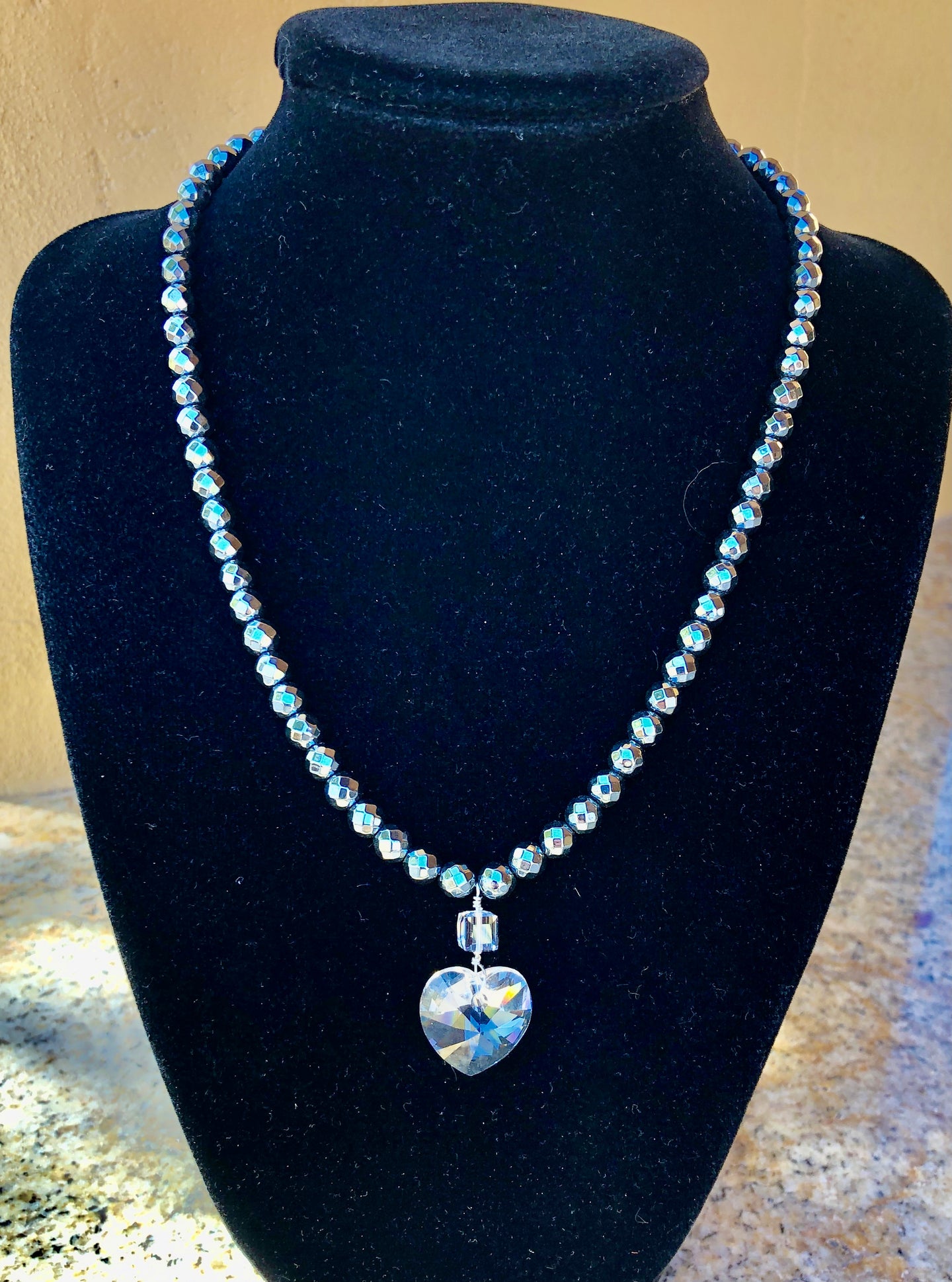 Necklace - Faceted Hematite, Sterling Silver Clasp, Swarovski Heart Pendant