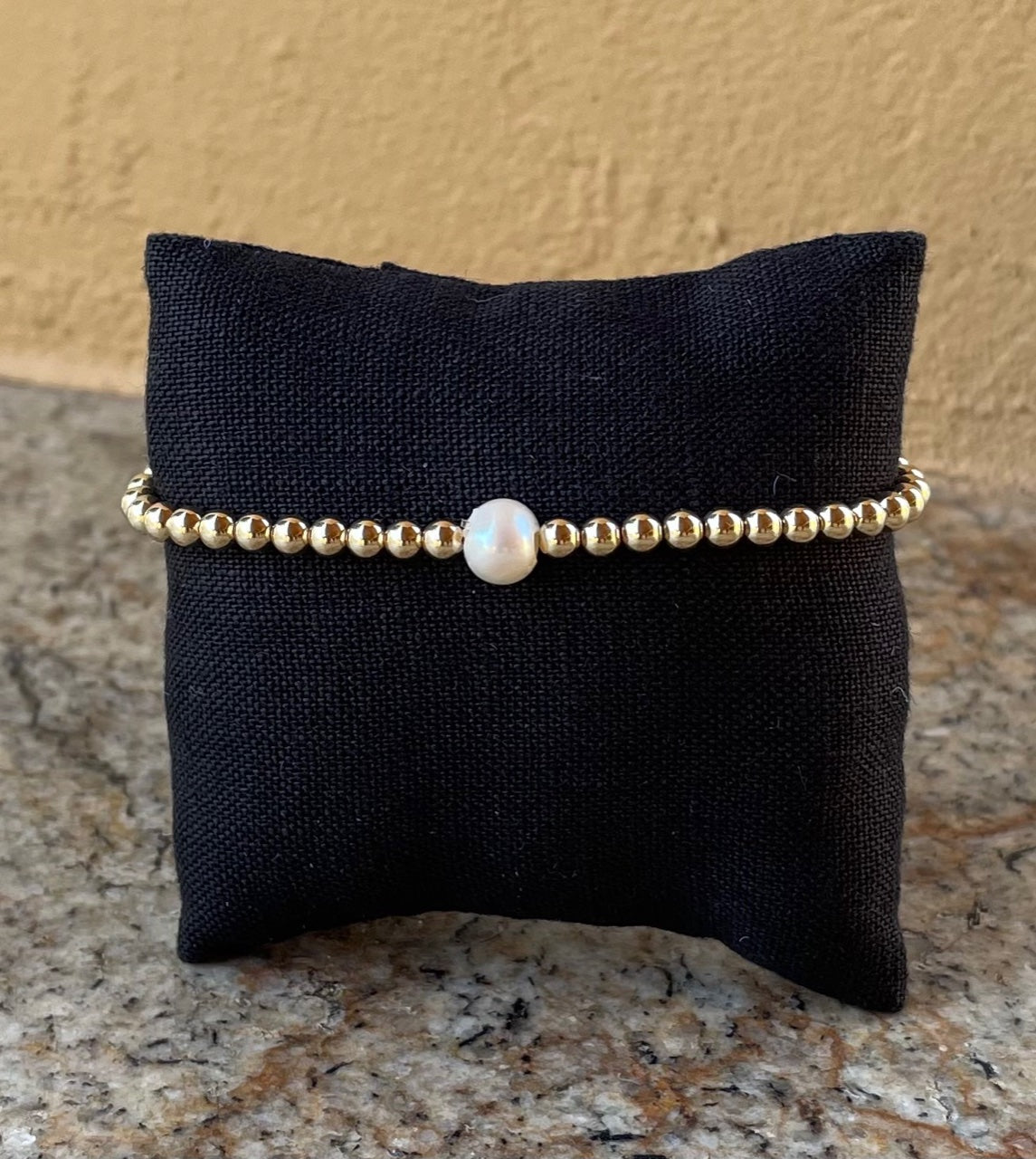 Bracelet - 14K gold filled beaded stretch bracelet with a white freshwater pearl
