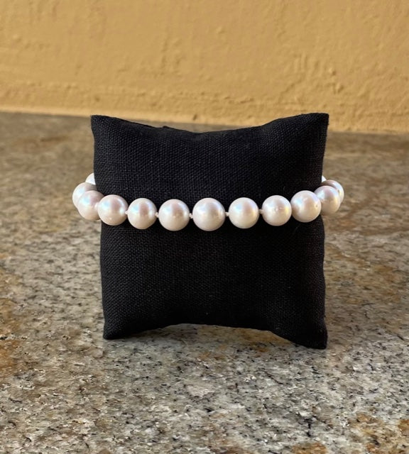 Bracelet - 11mm knotted pearl bracelet with diamond clasp