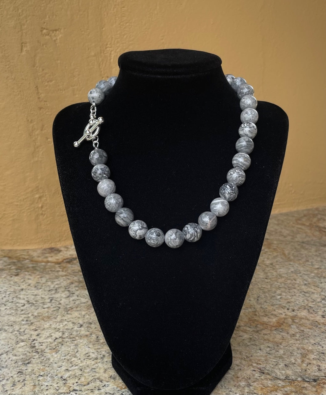 Necklace - 14mm grey jasper beads with a chunky sterling silver toggle