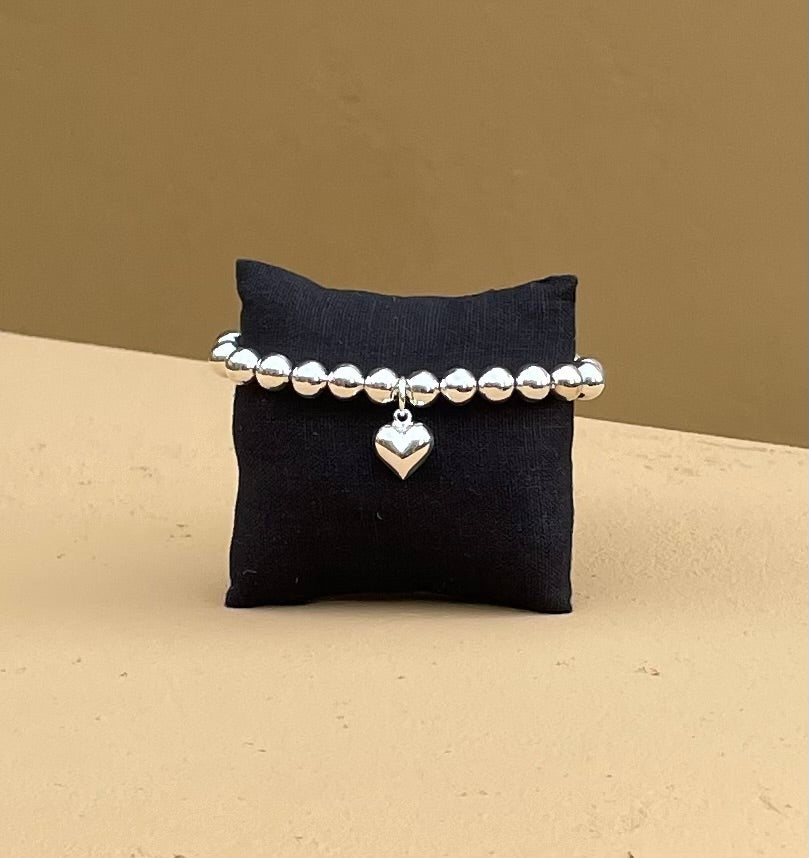 Stretch Bracelet - 8mm round sterling silver beads with a sterling silver puff heart charm