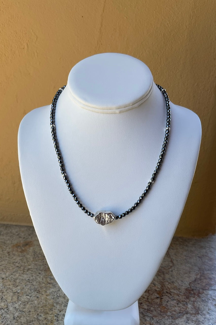 Necklace - Faceted hematite with sterling silver spacers and large nugget