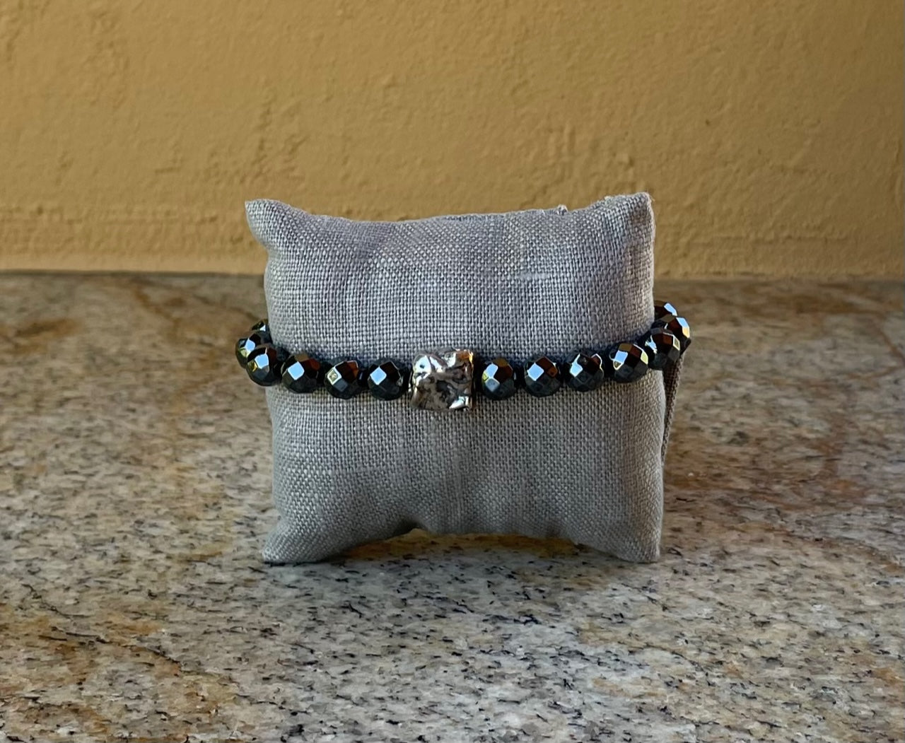 Bracelet - Faceted hematite with 4 oxidized sterling silver nuggets