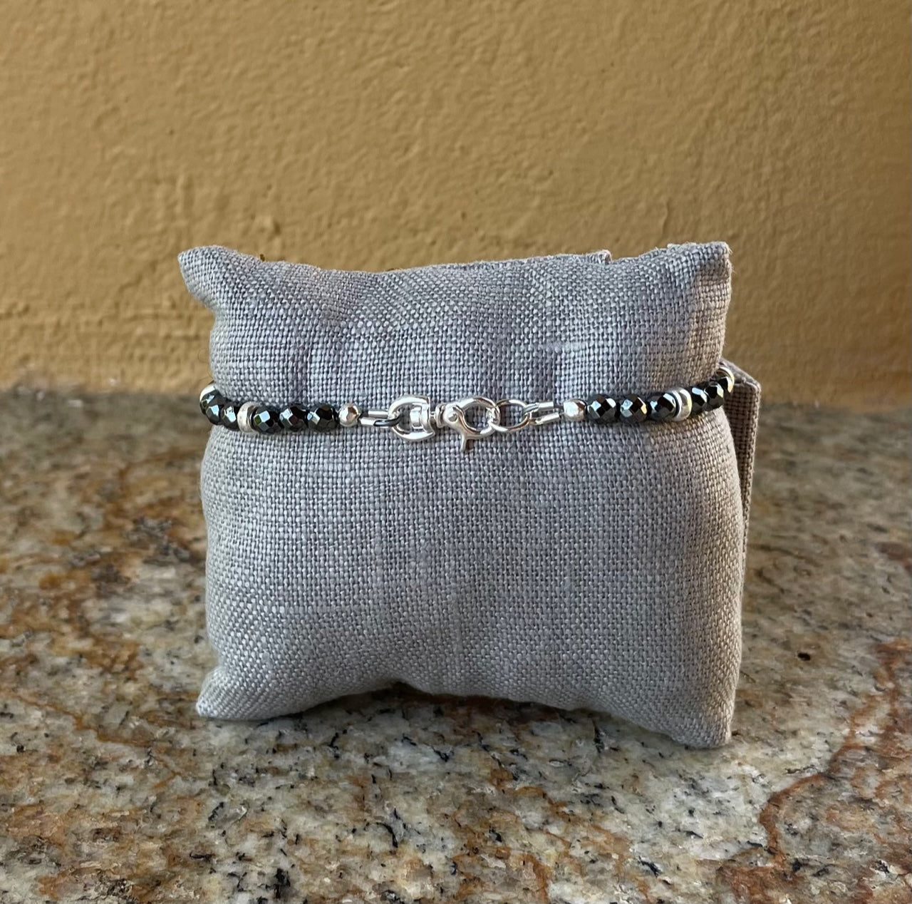 Bracelet - faceted hematite with sterling silver clasp